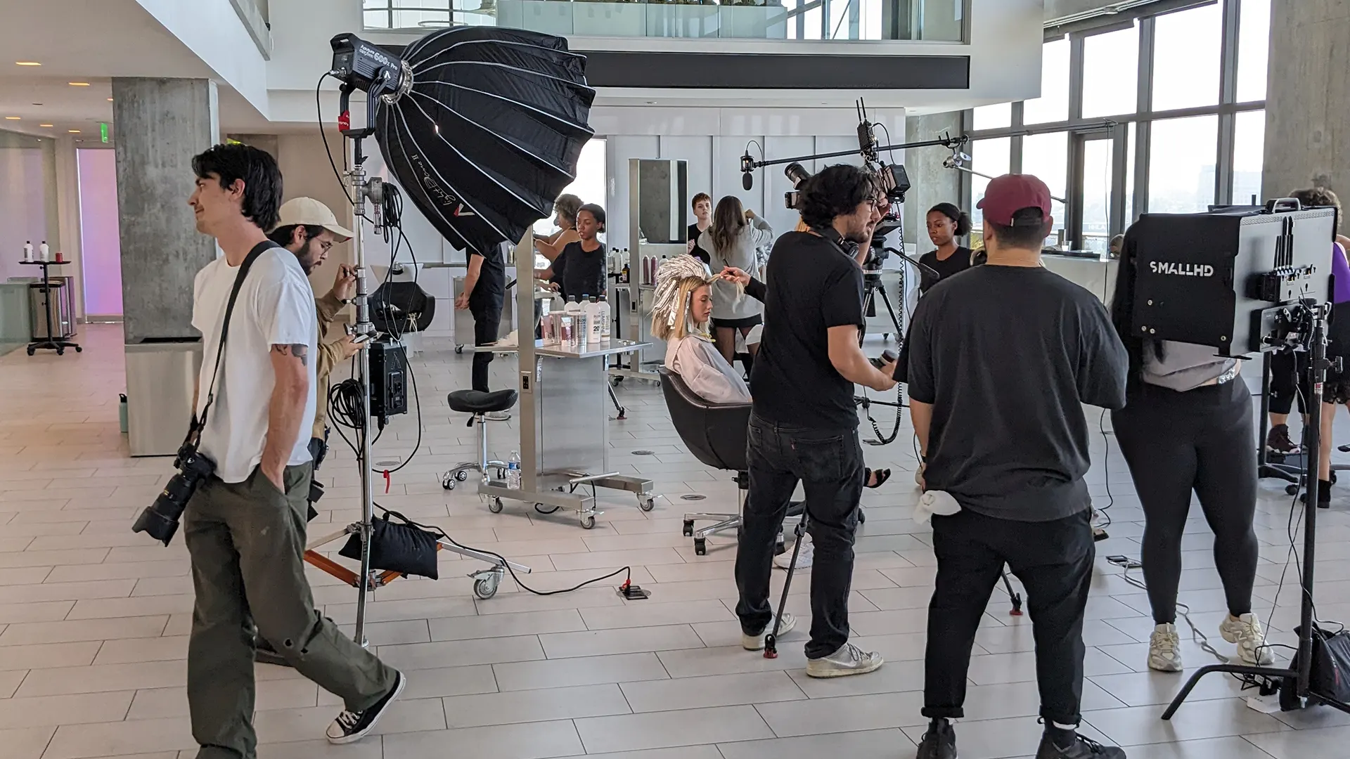 Setting up lighting for a model photoshoot